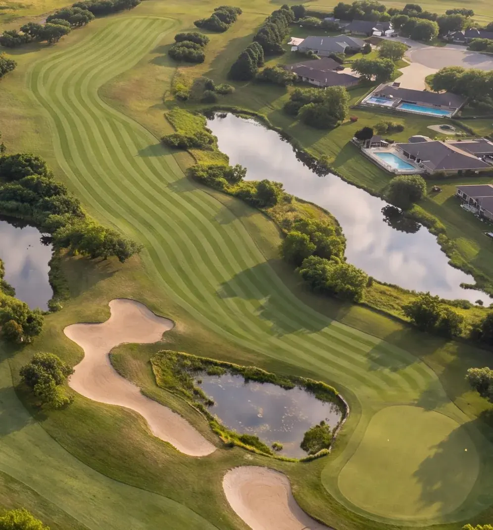 A striped fairway mowed by robotic mowers