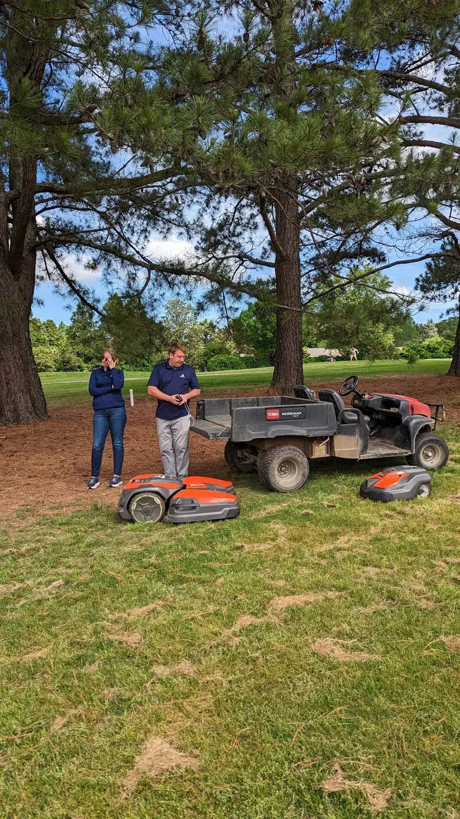 The TerraSync crew with a golf cart and a CEORA on a trailer