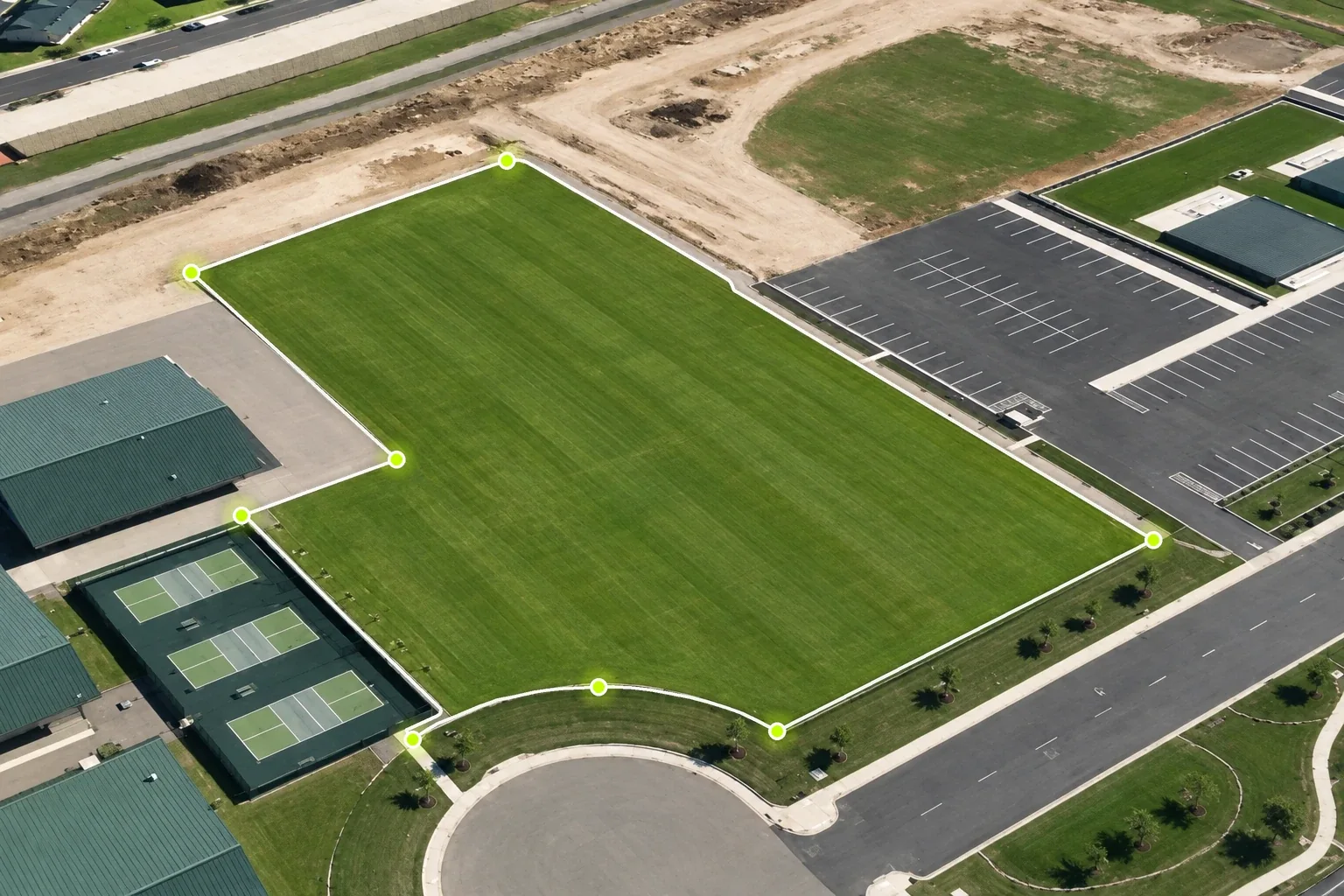 An aerial view of a campus lawn with its mapped zone outlined.